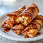 Cheesecake Egg Rolls With Caramel Sauce